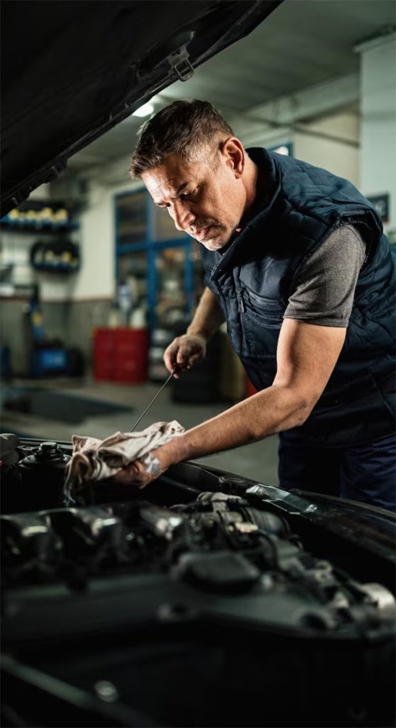 car mechanic fixing car